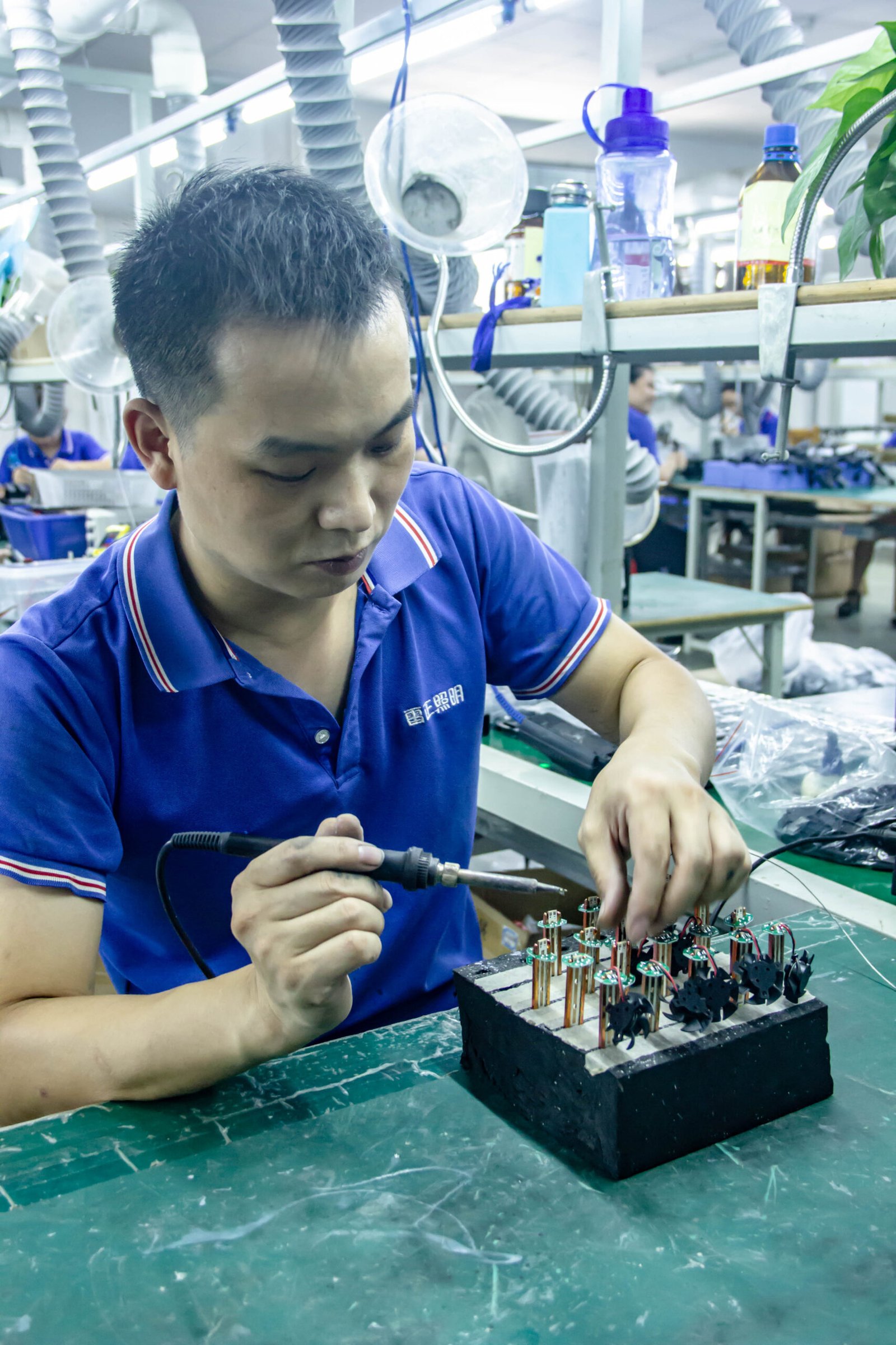 the worker is installing a fan for led lights